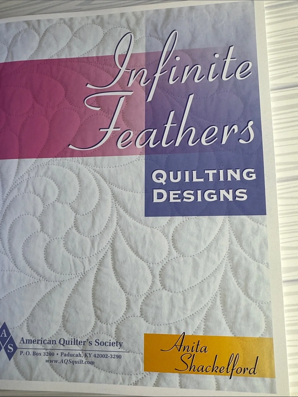 Infinite Feathers Quilting Designs - White with Pink & Purple Accents